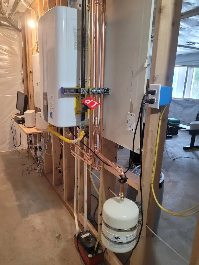 Licensed plumber repairing a kitchen sink in Devils Lake